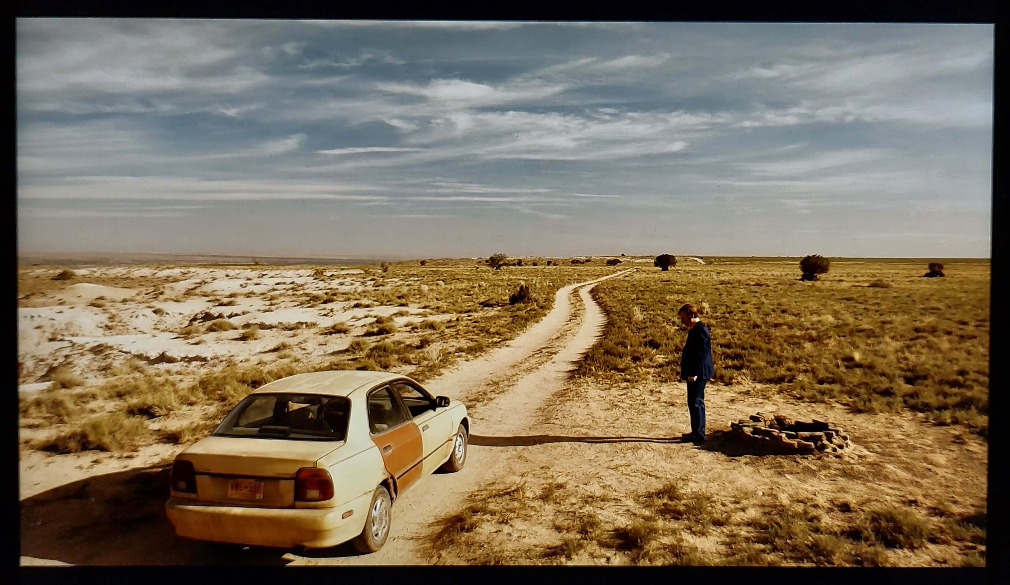 Saul standing in the desert next to his car - Captured from Netflix
